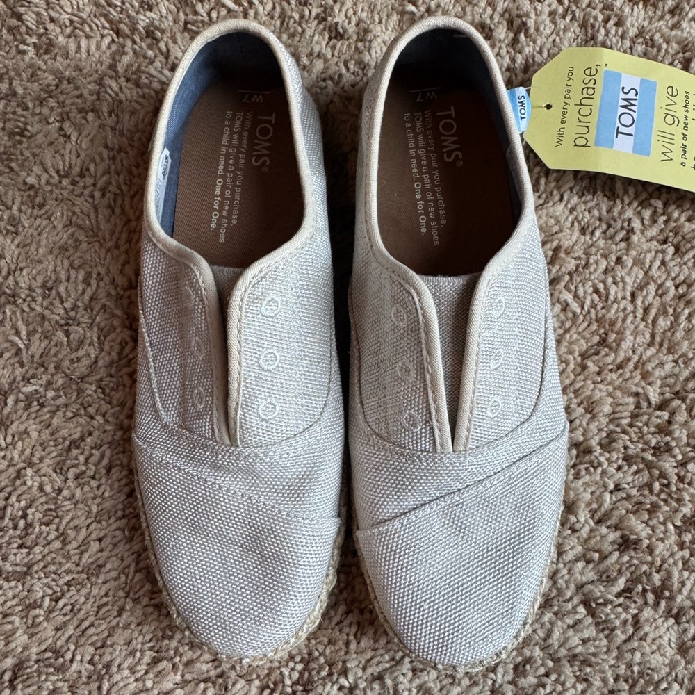 TOMS Light Tan Canvas Slip-Ons